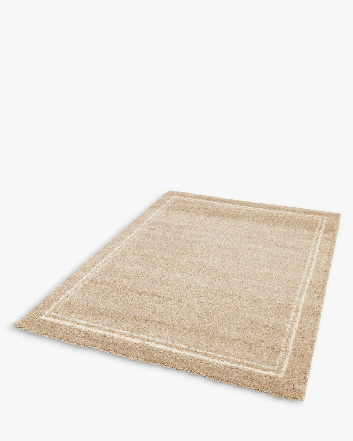 tapis de salon Estero petit format beige à double bordure écrue - vue de trois quarts